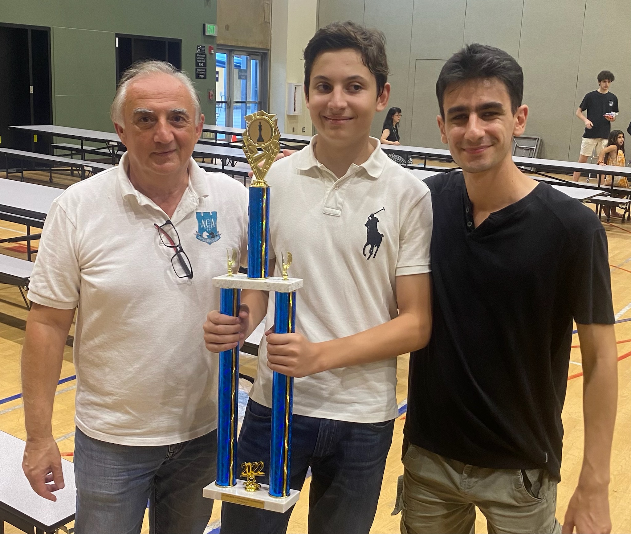 With Armen Ambartsoumian, the founder of the American Chess Academy, and his student, K-12 OPEN champion Mark Torosyan